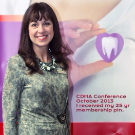 Beth receiving her 25 yr pin from CDHA